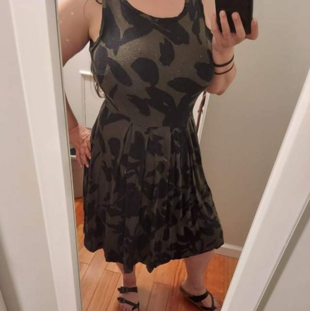 Black and green patterned fit and flare pleated tank dress